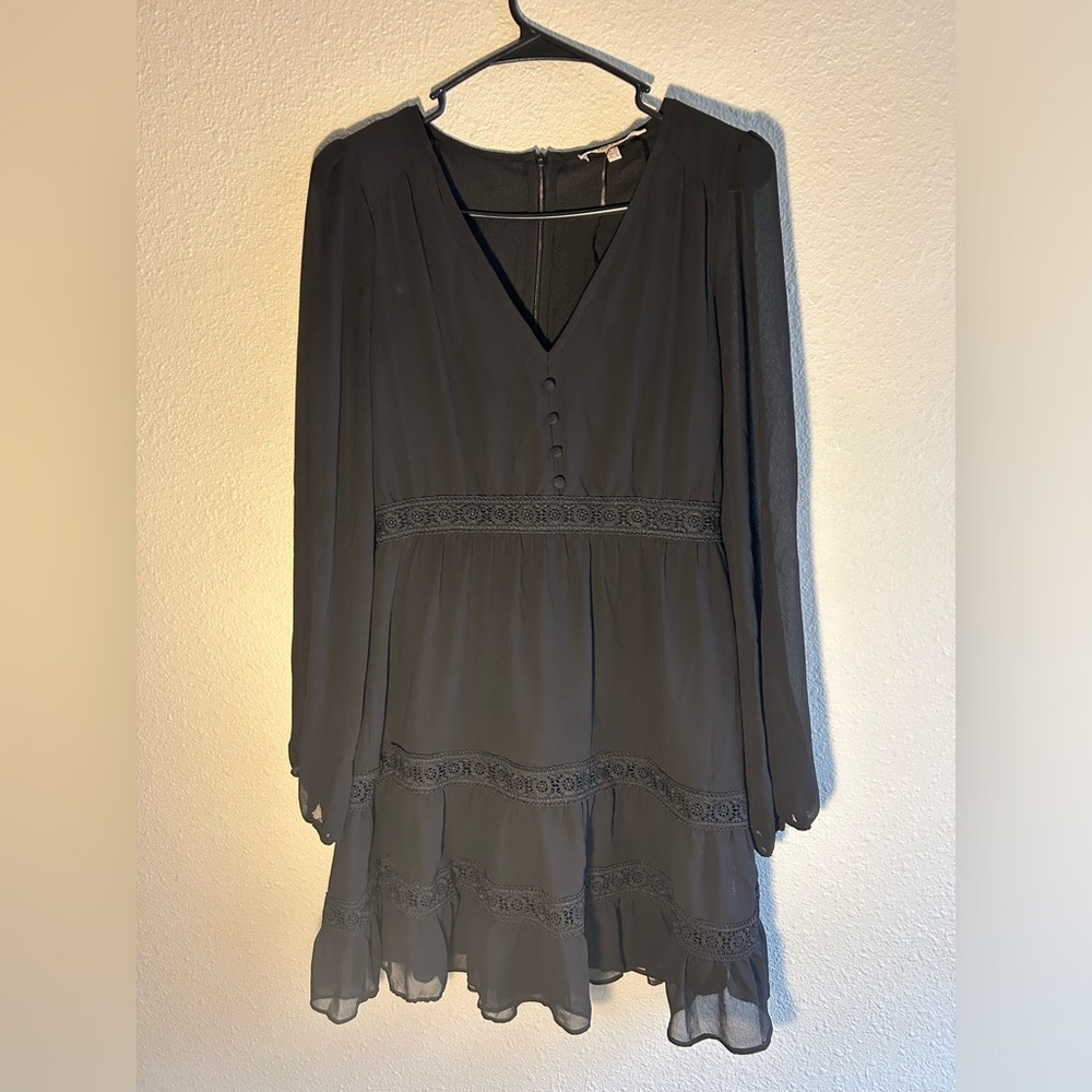 Black lightweight party dress is from the Turkish Brand Koton Partywear.